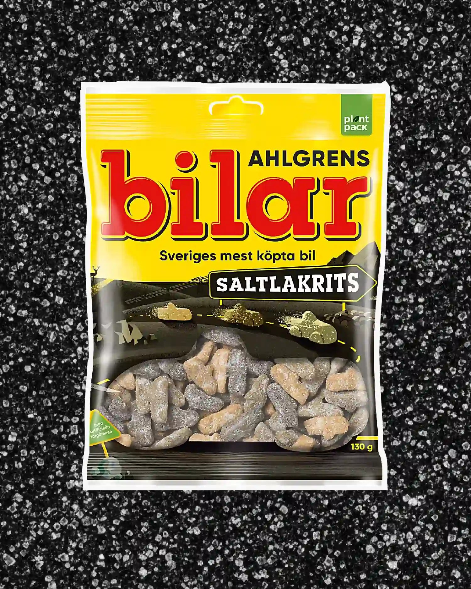 Ahlgrens Bilar Saltlakrits – Swedish salty licorice foam candy cars in black coloron a black sugary background