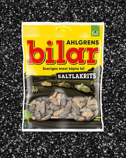 Ahlgrens Bilar Saltlakrits – Swedish salty licorice foam candy cars in black coloron a black sugary background